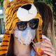 Image for article titled This 'Genius' Designer Is Selling Masks With a Straw-Sized Mouth Hole, Because Drinking With Friends Is Way More Important Than Safety